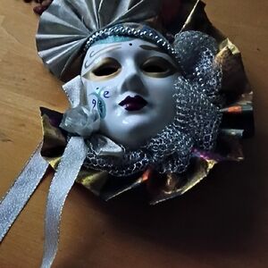 Elegant Ceramic Mask with Gold and Silver Accents